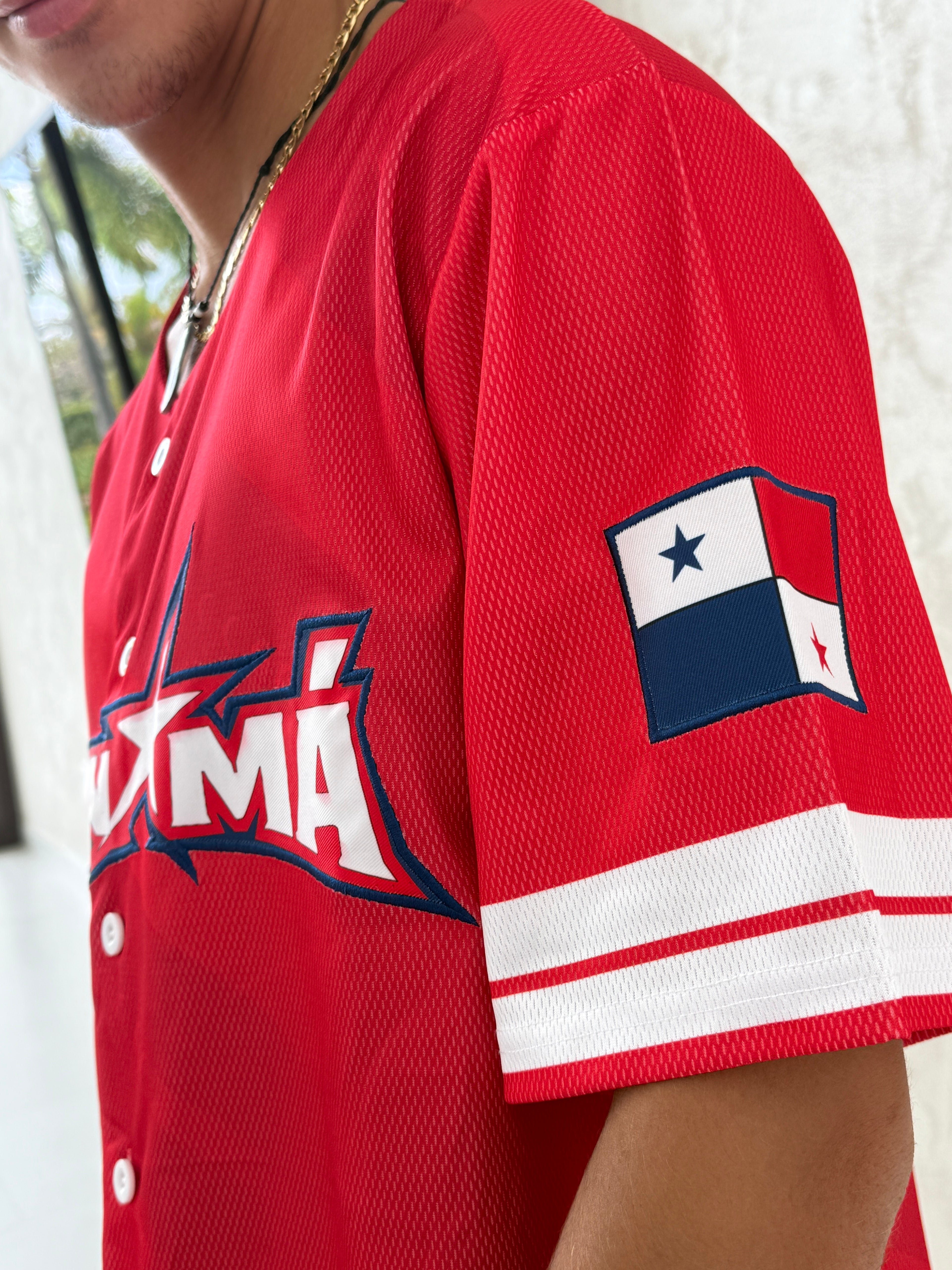 Red sports jersey with Panamanian flag emblem