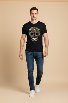 Man wearing a black t-shirt with a colorful skull design on a beige background