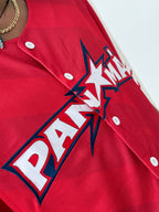 Red baseball jersey with a prominent logo on a white background