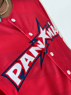 Red baseball jersey with a prominent logo on a white background