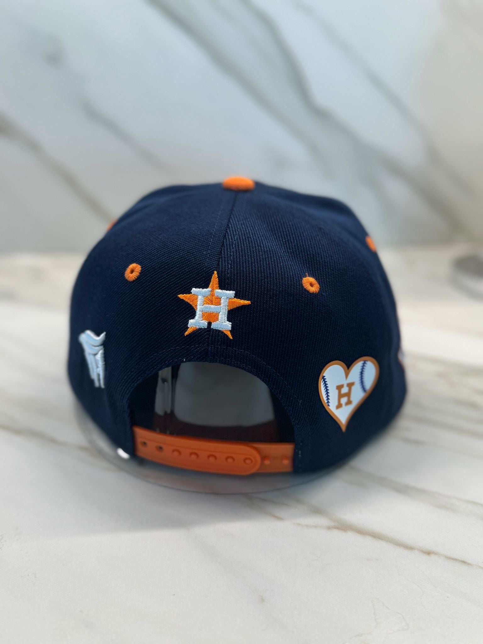 Back adjustable strap of Houston baseball hat

