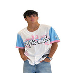 Person wearing a 'Miami' themed baseball jersey on a white background