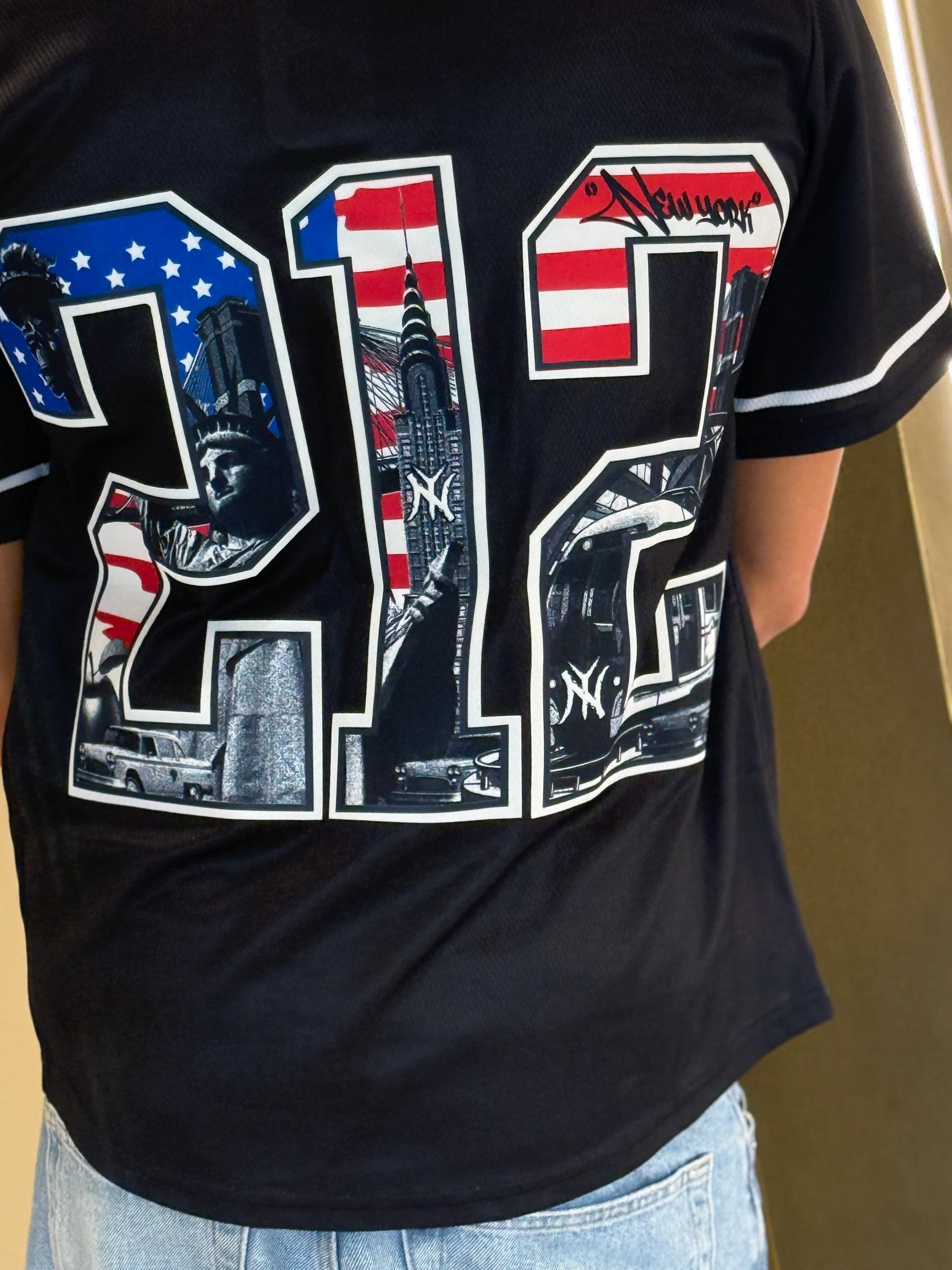 Black t-shirt with American-themed design featuring the number '21' and iconic symbols.