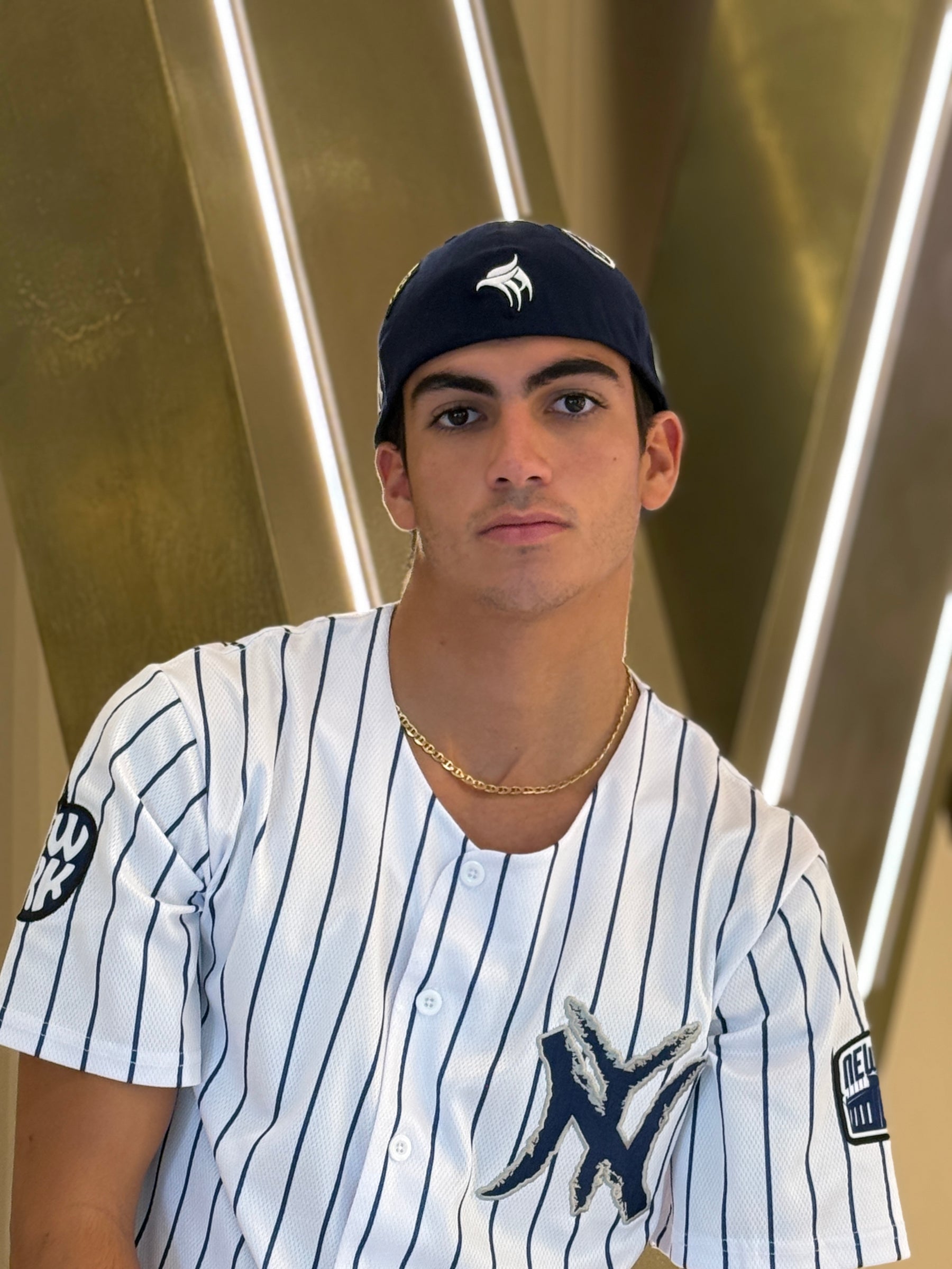 New York-inspired white button-up baseball jersey with relaxed fit