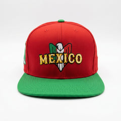 Red and green cap with 'Mexico' and a logo on a white background