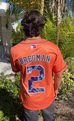 Orange button-up baseball jersey with relaxed streetwear fit