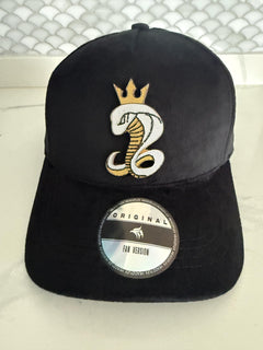Black velvet snapback hat with crowned cobra emblem front view
