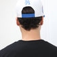Back of snapback hat with adjustable strap

