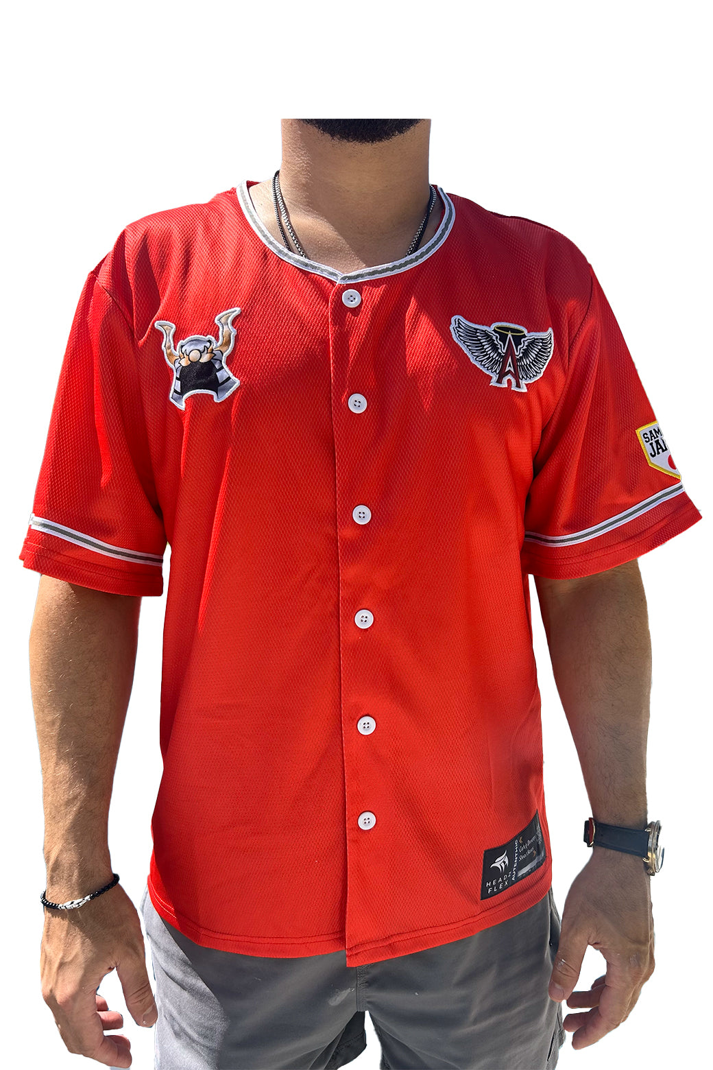 Red baseball jersey with logos on a white background
