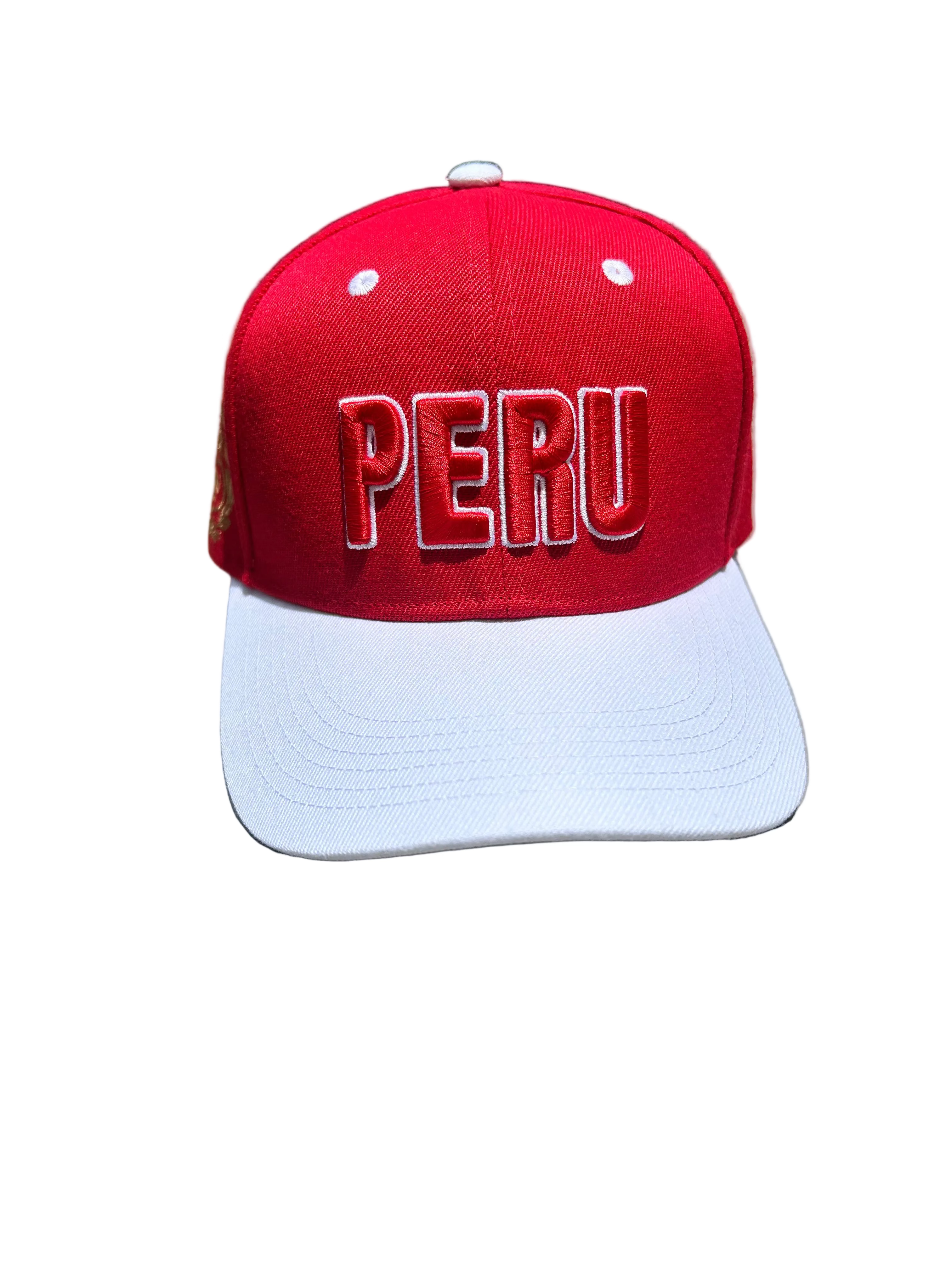 A red and white baseball cap with 'PERU' embroidered in 3D on the front and the Coat of Arms of Peru on the sides, displayed on a flat surface. Main image