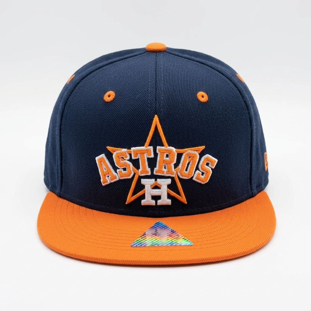 Navy and orange Houston Astros cap on a white background