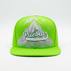 Green cap with 'Puebla' text on a white background