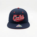 Navy blue cap with 'Cubs' logo on a white background