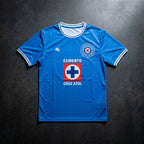 Blue sports jersey with visible branding on a dark background