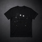 Black t-shirt with a constellation design on a dark gray background