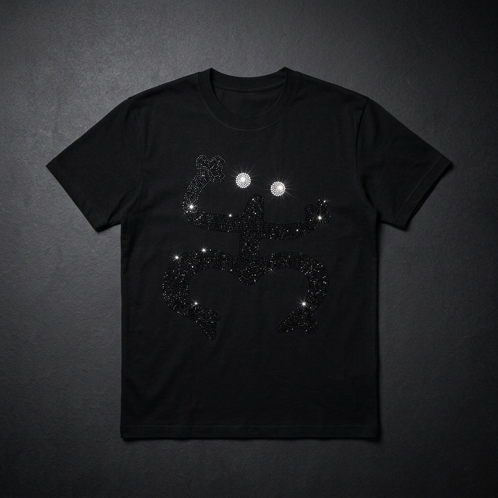 Black t-shirt with a constellation design on a dark gray background