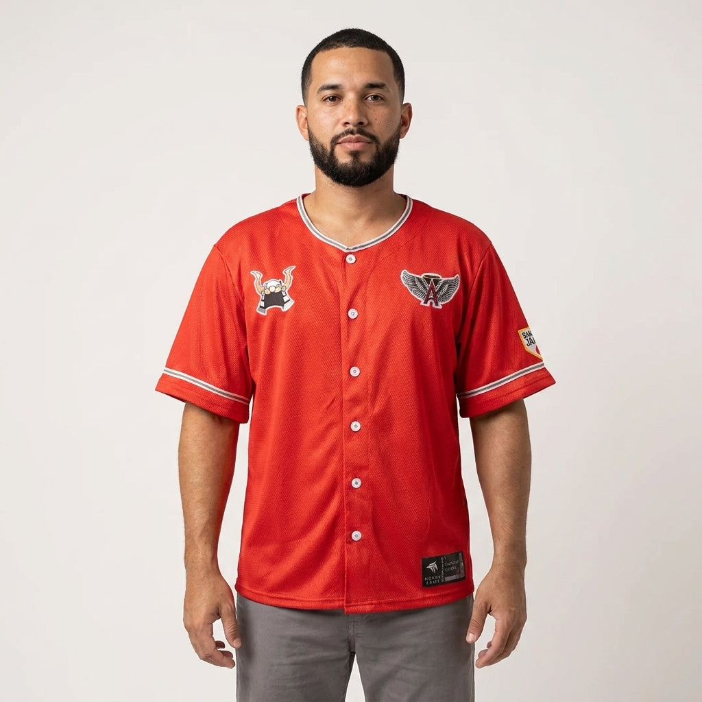 Man wearing a red baseball jersey with logos on a white background
