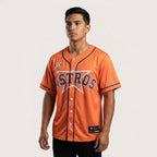 Orange button-up baseball jersey with relaxed streetwear fit