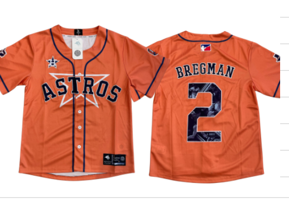 An orange baseball jersey with 'ASTROS' embroidered on the front and the name 'BREGMAN' along with the number '2' on the back. The jersey features a button-up design and a star logo.